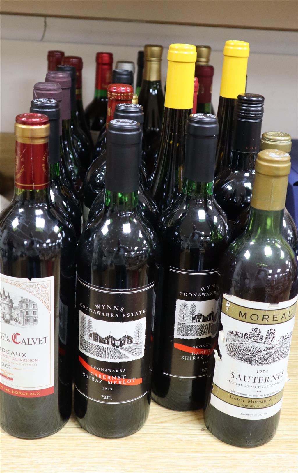 Twenty eight bottles of mixed wine including Chateauneuf de Pape, St Emilion Vieux Ramparts, Sauternes etc.